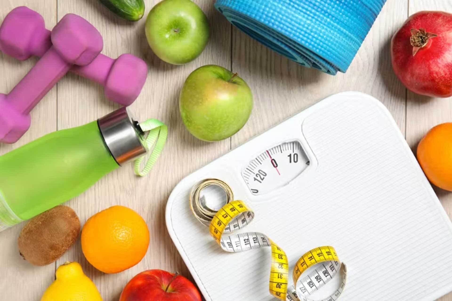 free BMI calculator online, Two women celebrating fitness milestone